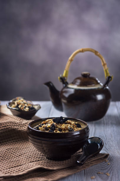 istock Oatmeal porridge with walnuts and raisins 919519208
