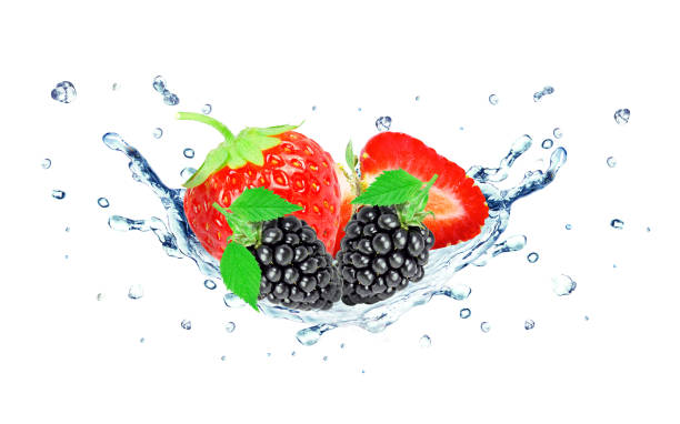 istock strawberry and blackberry splash water 919520586