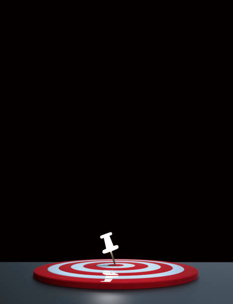 istock Glowing thumbtack placed in the target on dark background. Business target concept. 919520674