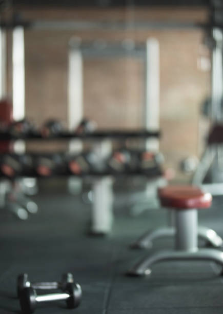 istock Blurred Fitness gym background 919530388