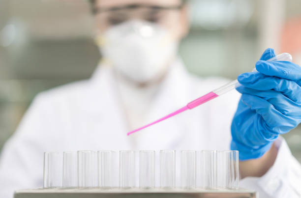istock Young female scientist working in laboratory 919539354