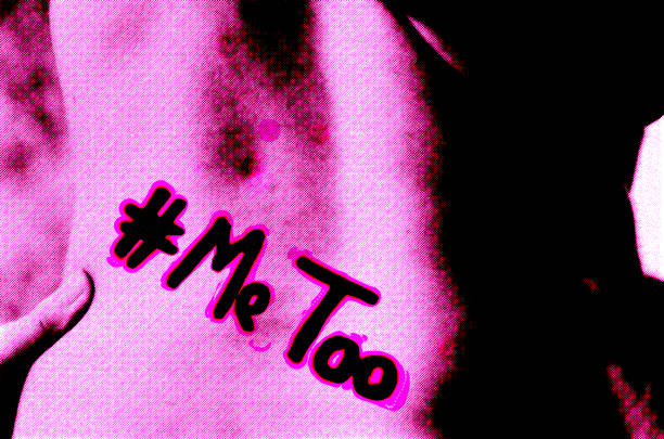 istock Me Too written on a woman's back 919539362