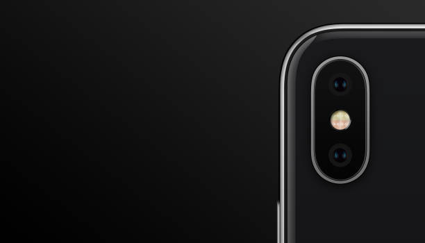 Smartphone camera module. New modern black smartphone back side with dual camera module on black gradient background. Smartphone camera lens closeup. Banner with copy space.