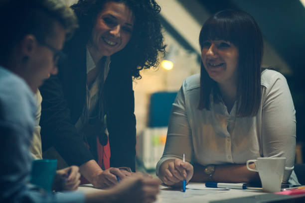 istock Businesswomen Working Late 919541714