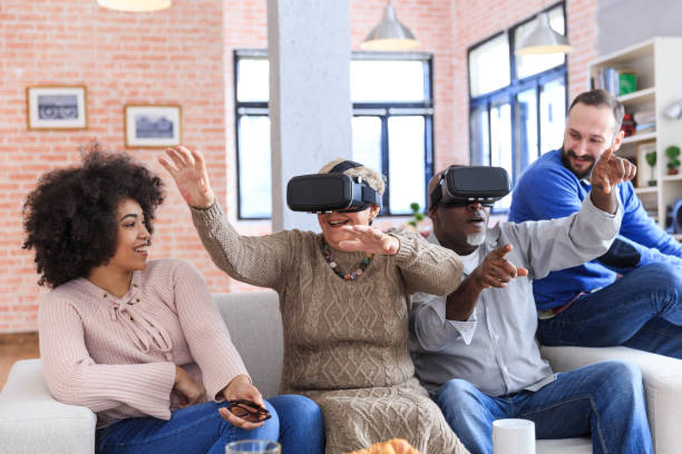 istock Mixed race family playing with VR 919547740