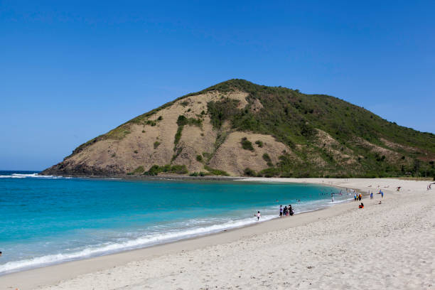 istock Beautiful ocean beach with mountain 919551442
