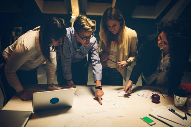 istock Businesswomen Working Late 919551578