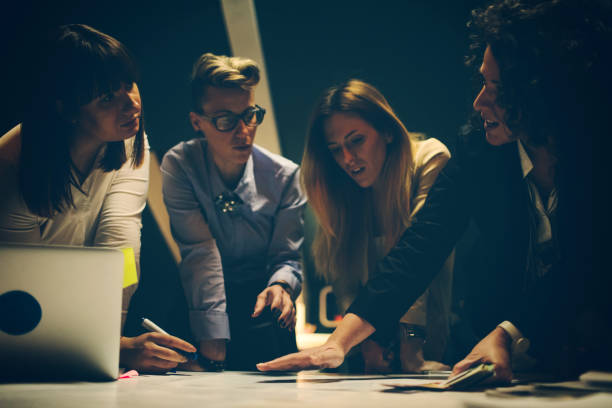istock Businesswomen Working Late 919551794