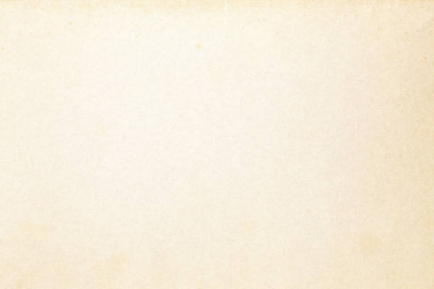 istock Old pale yellow paper texture 919554410