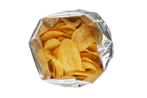 istock Potato chips in a silver package isolated on a white background close-up. 919561164