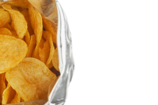 istock Potato chips in a silver package isolated on a white background close-up. 919561234