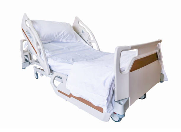 Patient bed with clipping path, isolated on white background. stock photo