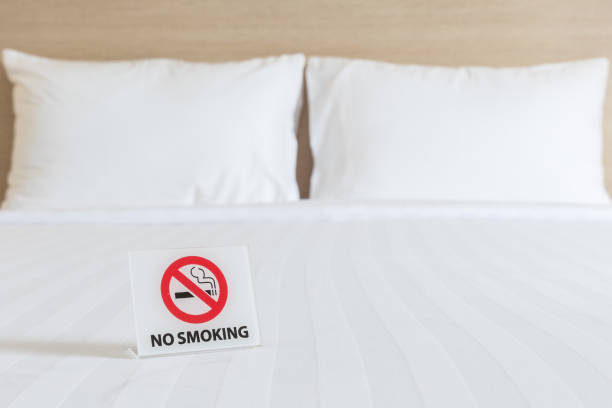 istock NO SMOKING Sign on the bed in hotel room 919567726