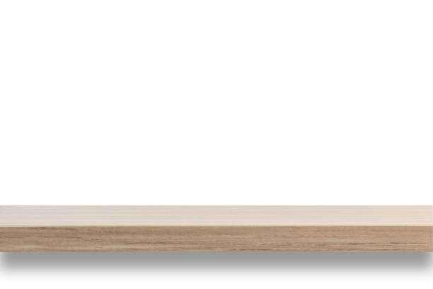 istock Empty top of wooden shelf isolated on white background 919567772