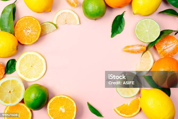 Citrus Fruits Frame On Pink Background Stock Photo - Download Image Now - Citrus Fruit, Backgrounds, Flat Lay