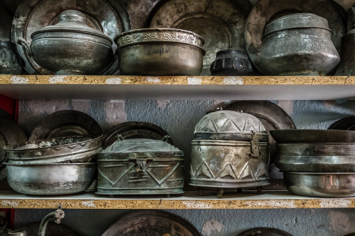 Antique copper pots and vases for sale in an antique shop at Harput, Elazig