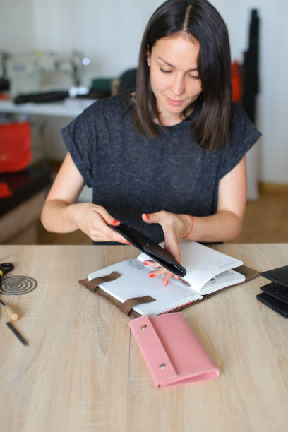 istock Girl showing how to make leather pu 919577928