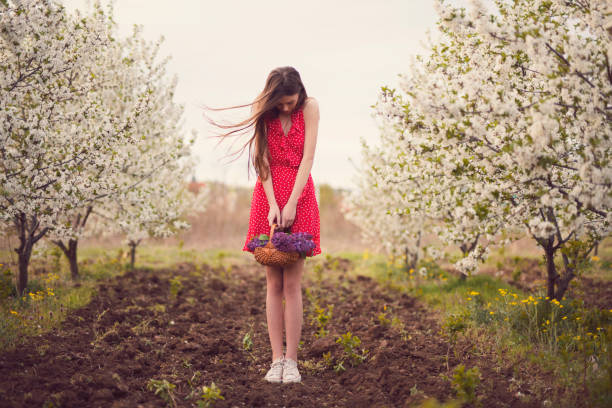 istock Cute And Shy Spring Girl 919580056