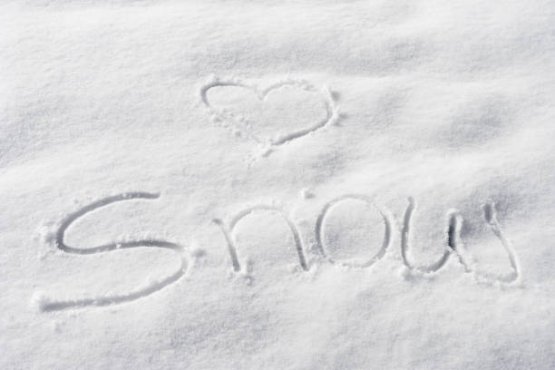 istock Love snow is written on the snow 919580106