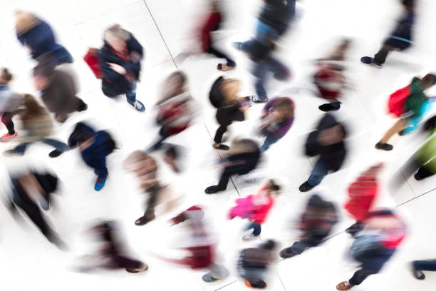 istock Walking people, two persons use a smart phones 919593640