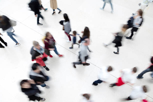 istock Large Group of Walking People 919599346
