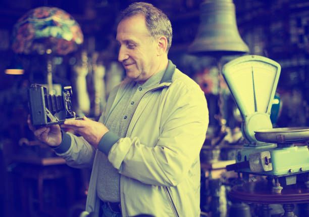 istock Male visiting old things market 919605030