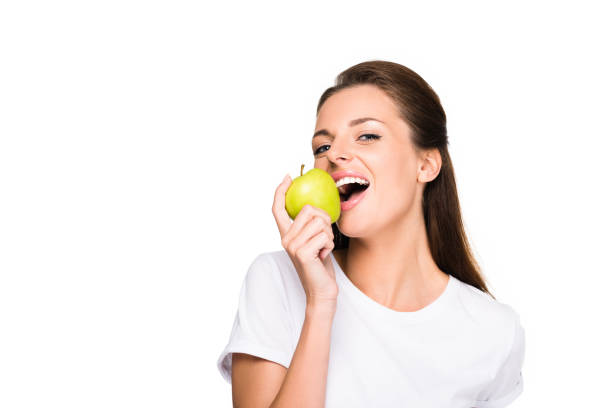 istock woman with fresh apple 919605254