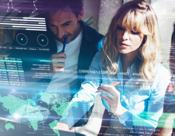 istock Concept of digital diagram,graph interfaces,virtual screen,connections icon on blurred background.Group of two young coworkers working together at modern coworking studio.Horizontal. 919607972