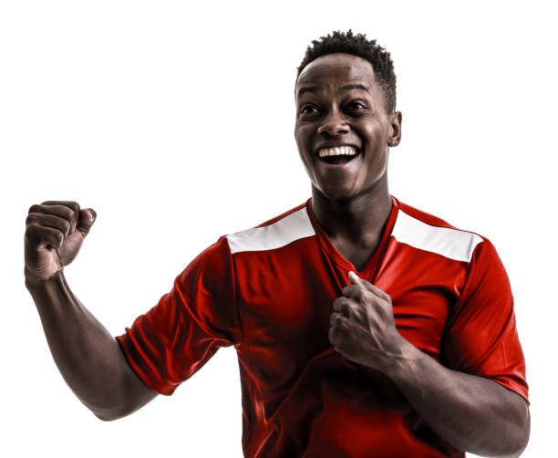 istock Fan / Sport Player on red uniform celebrating on white background 919608172