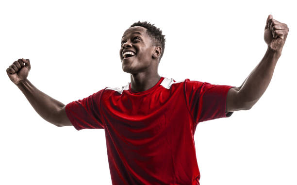 istock Fan / Sport Player on red uniform celebrating on white background 919608184