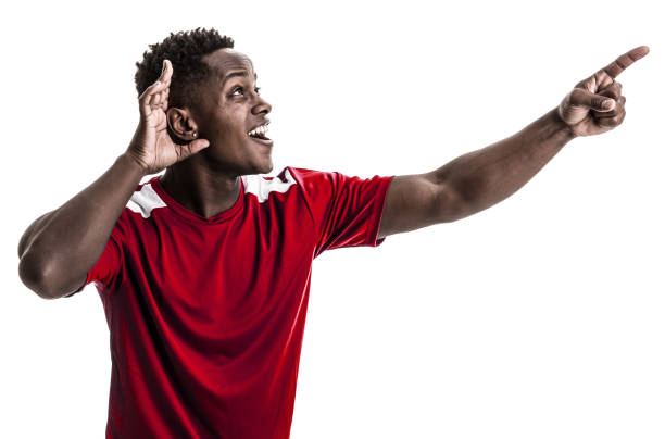 istock Fan / Sport Player on red uniform celebrating on white background 919608200