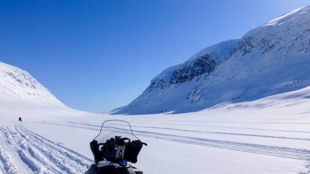 istock Snowmobile safari down in a valley 919631858