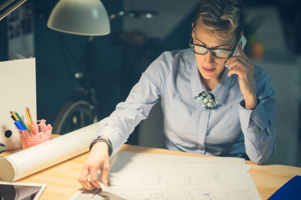 istock Businesswoman Working Late 919632054