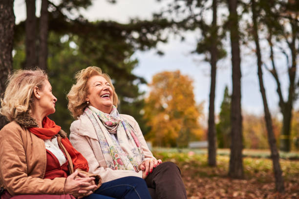 istock Two senior friends at the park. 919644298