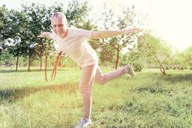 istock Positive man keeping his body in bird position 919652976