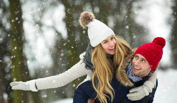 istock Couple in love in winter scenery 919654520