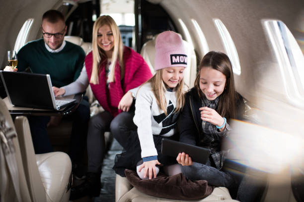istock Family in the airplane 919658812