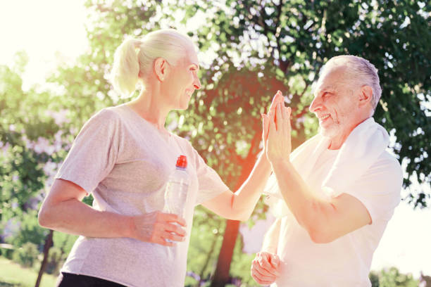 istock Elderly couple keeping palms together 919659830