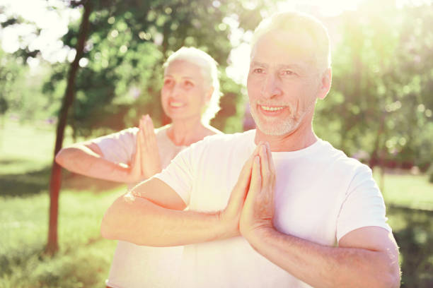 istock Cheerful family meditating in fresh air 919662104