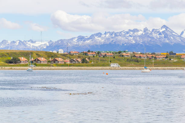 istock Beagle channel, mountains and buildings in Ushuaia 919662204