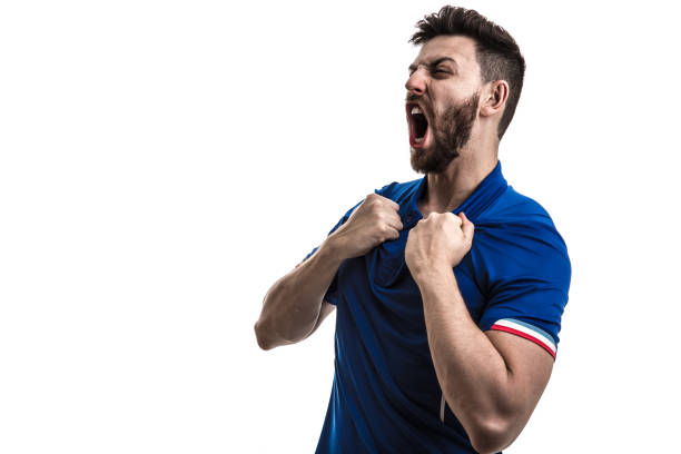 istock Fan / Sport Player on blue uniform celebrating 919666164