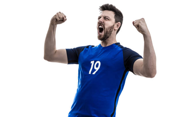 istock Fan / Sport Player on blue uniform celebrating 919666176