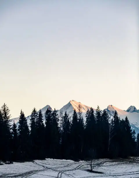 Inspiring Mountains landscape in winter Tatras. Looking at high Tatra Mountains at sunset