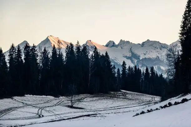 Inspiring Mountains landscape in winter Tatras. Looking at high Tatra Mountains at sunset, panorama view.