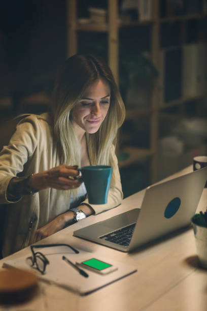 istock Businesswoman Working Late 919666788