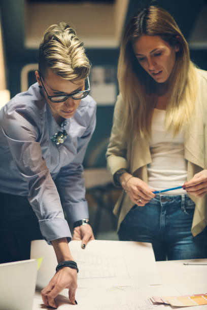 istock Businesswomen Working Late 919673794