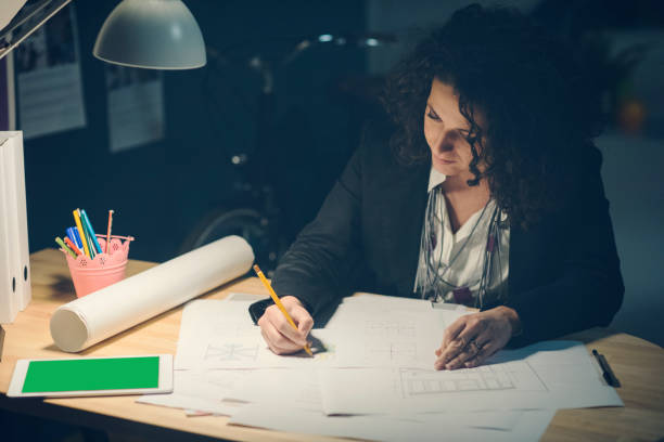 istock Businesswoman Working Late 919680086