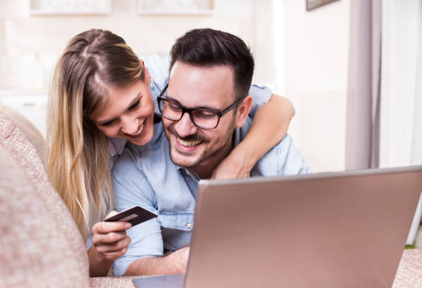 istock Young couple shopping online 919690602