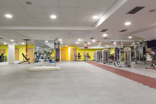 Interior of a gym with equipment stock photo