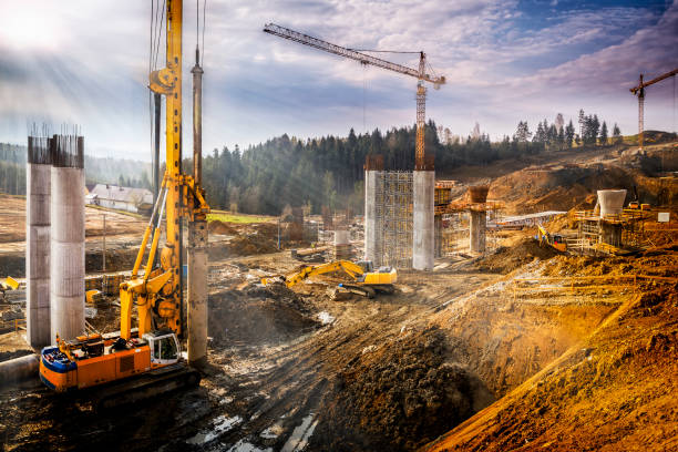 Sunset over construction of the viaduct on the new S7 highway, Poland Sunset over construction of the viaduct on the new S7 highway, Rabka, Poland excavated material stock pictures, royalty-free photos & images